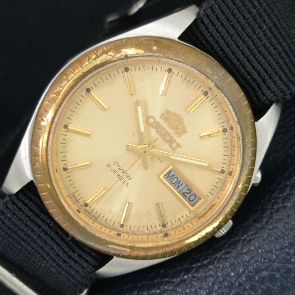 Vintage 1971 Orient Automatic Mens Silver Watch WDaydate  Gold Accents